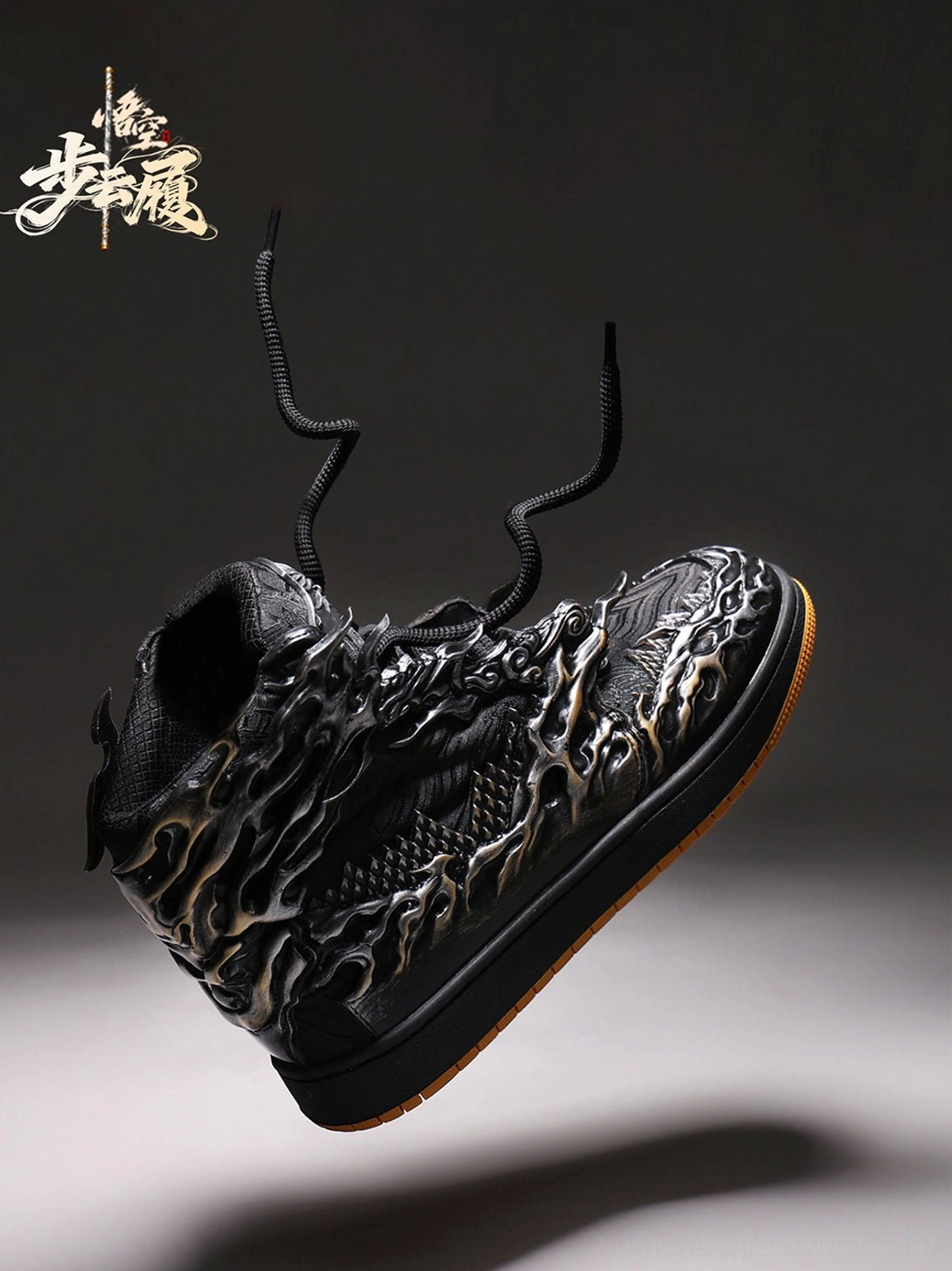 Rear floating view of Wukong cloud relief black and silver high-top sneakers showing laces tongue and gum sole