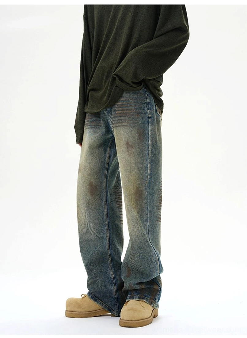 Y2K-inspired baggy ripped blue jeans designed with a loose silhouette, vintage wash, and everyday five-pocket styling