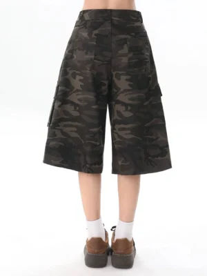 Back view of dark camouflage wide leg cargo culottes with rear pockets and relaxed Y2K streetwear silhouette