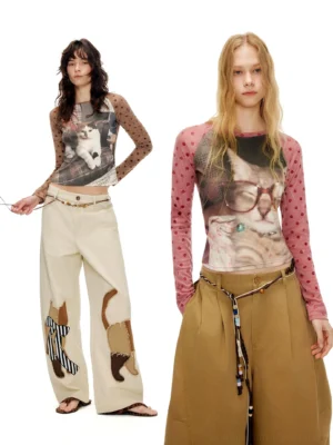 Y2K cat graphic polka dot mesh sleeve cropped baby tees styled with wide leg pants in white studio