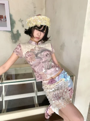 Model wearing a multicolor Y2K cheongsam collar anime print tee with contrasting beige collar and lace-spliced details in a vintage studio