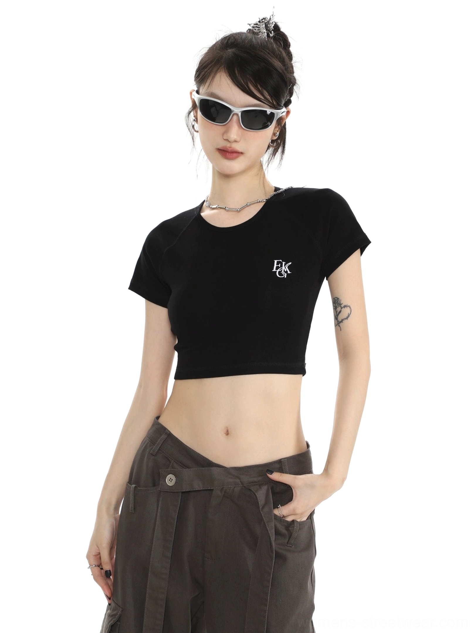 Embroidered Y2K cropped T-shirt for women shown in casual streetwear styling