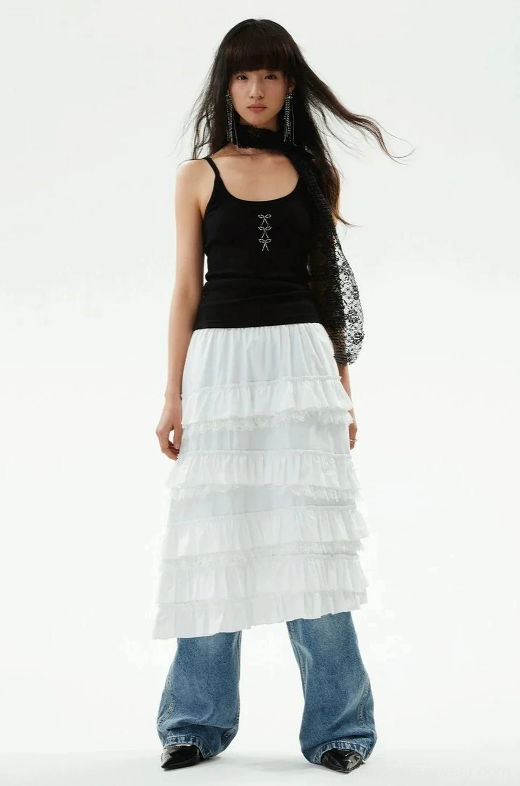 Y2K-inspired fitted ribbed tank top with delicate straps and feminine rhinestone bow accents