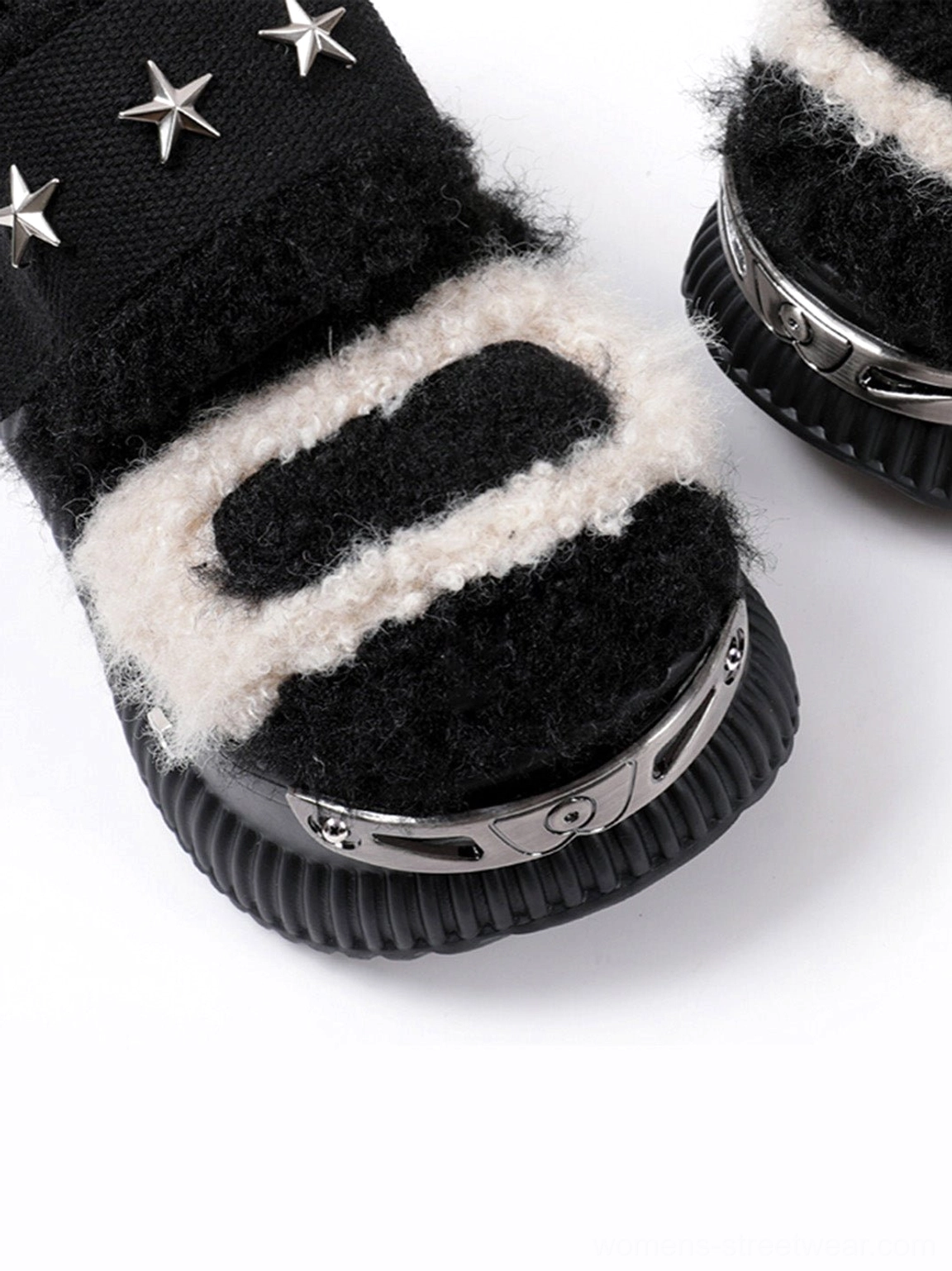 Close-up top view of Y2K fuzzy platform sneakers showing silver star rivets, beige and black textured panels, and chunky sole details