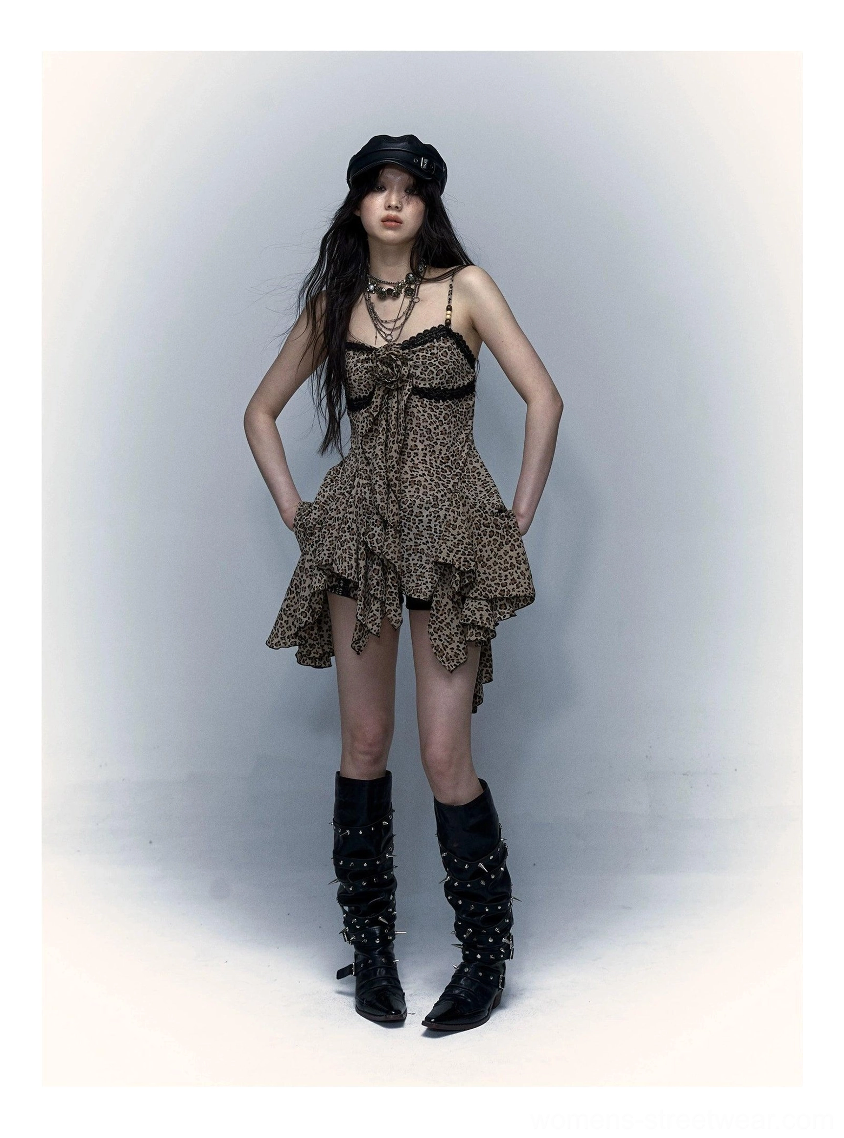 Leopard print semi-sheer camisole with gathered bow neckline lace trim and asymmetric handkerchief hem