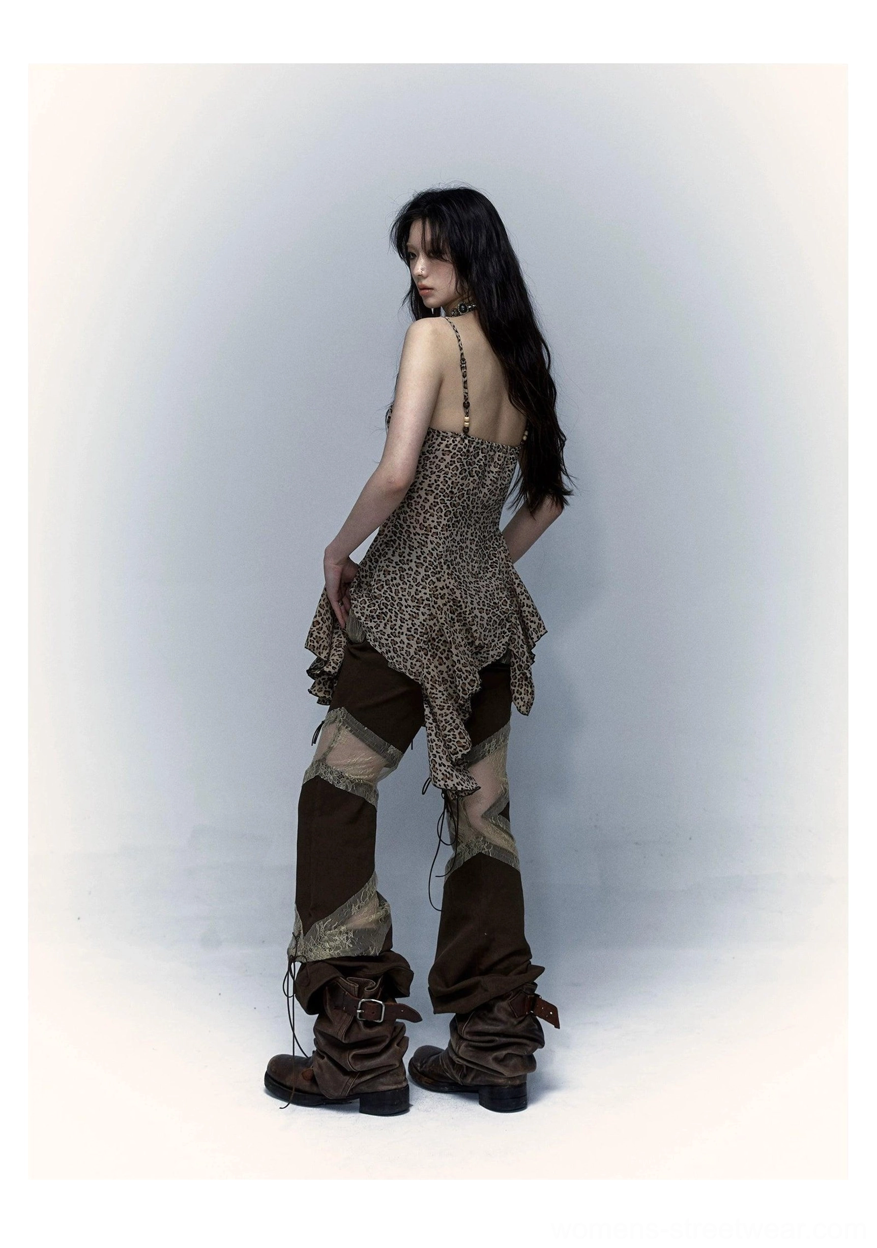 Side view of leopard print sheer handkerchief-hem camisole with open back and lace-trim straps