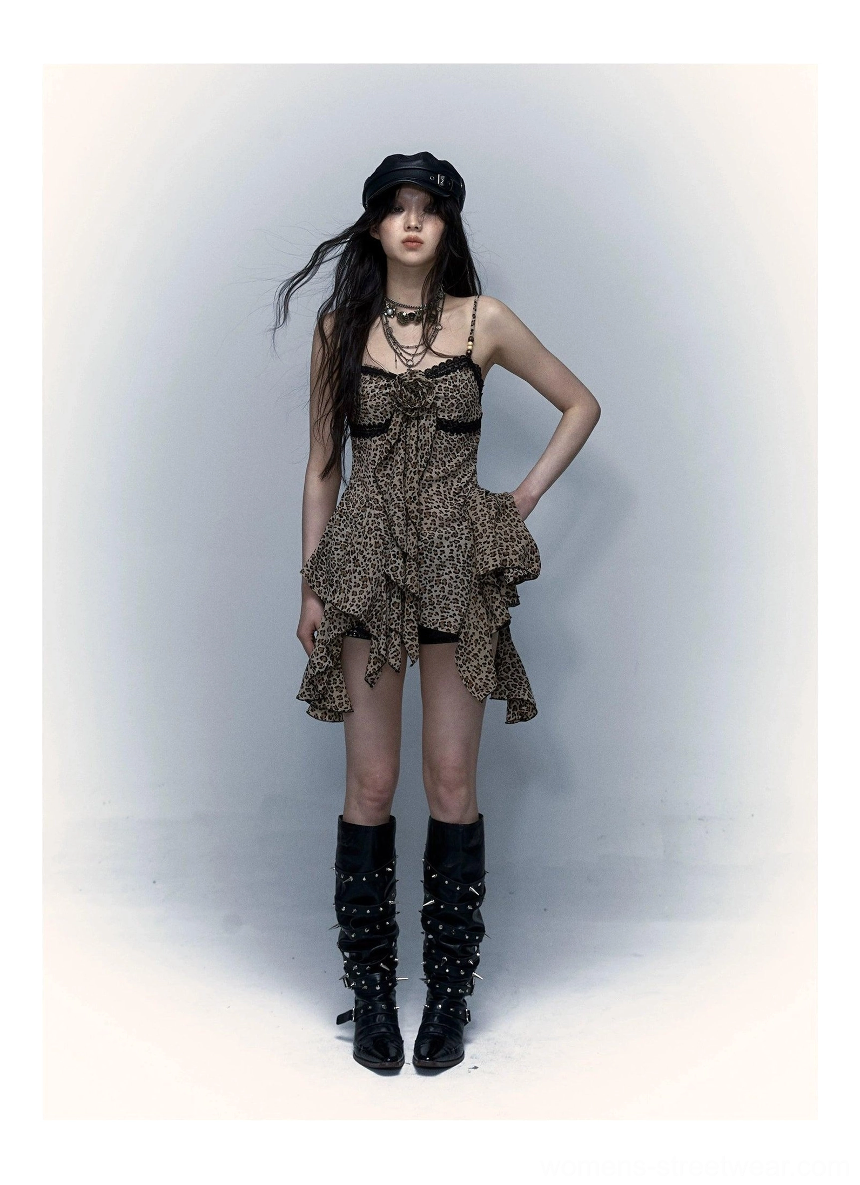 Leopard print Y2K lace-trim handkerchief-hem camisole styled with work boots and layered necklaces