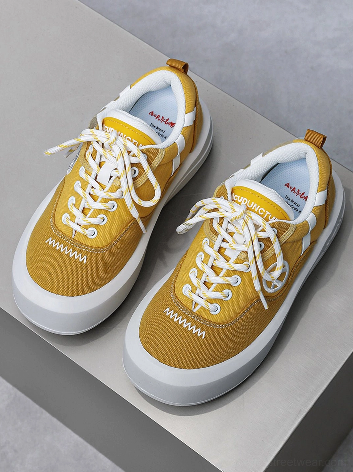 Y2K-inspired neon colorblock platform sneakers with retro skatewear proportions and vivid accent colors