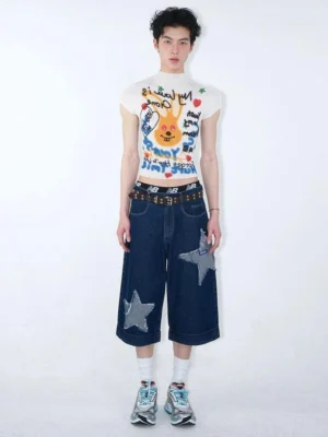 White cropped mock neck graphic T-shirt with colorful cartoon rabbit and graffiti print styled with wide-leg cropped denim and sneakers