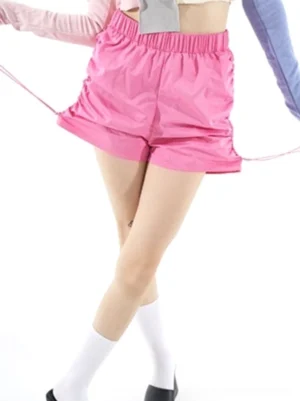 Hot pink Y2K ruched drawstring elastic waist athletic shorts shown in a full streetwear outfit