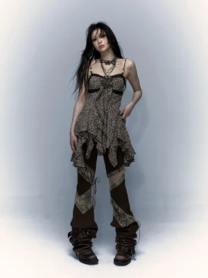 Leopard print Y2K sheer handkerchief-hem camisole styled with patchwork cargo pants and work boots front view