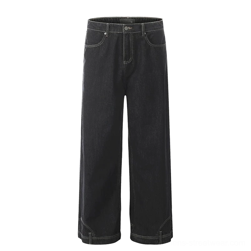 Y2K streetwear baggy jeans in wide-leg denim silhouette with relaxed proportions, long pooling hem, and versatile casual styling