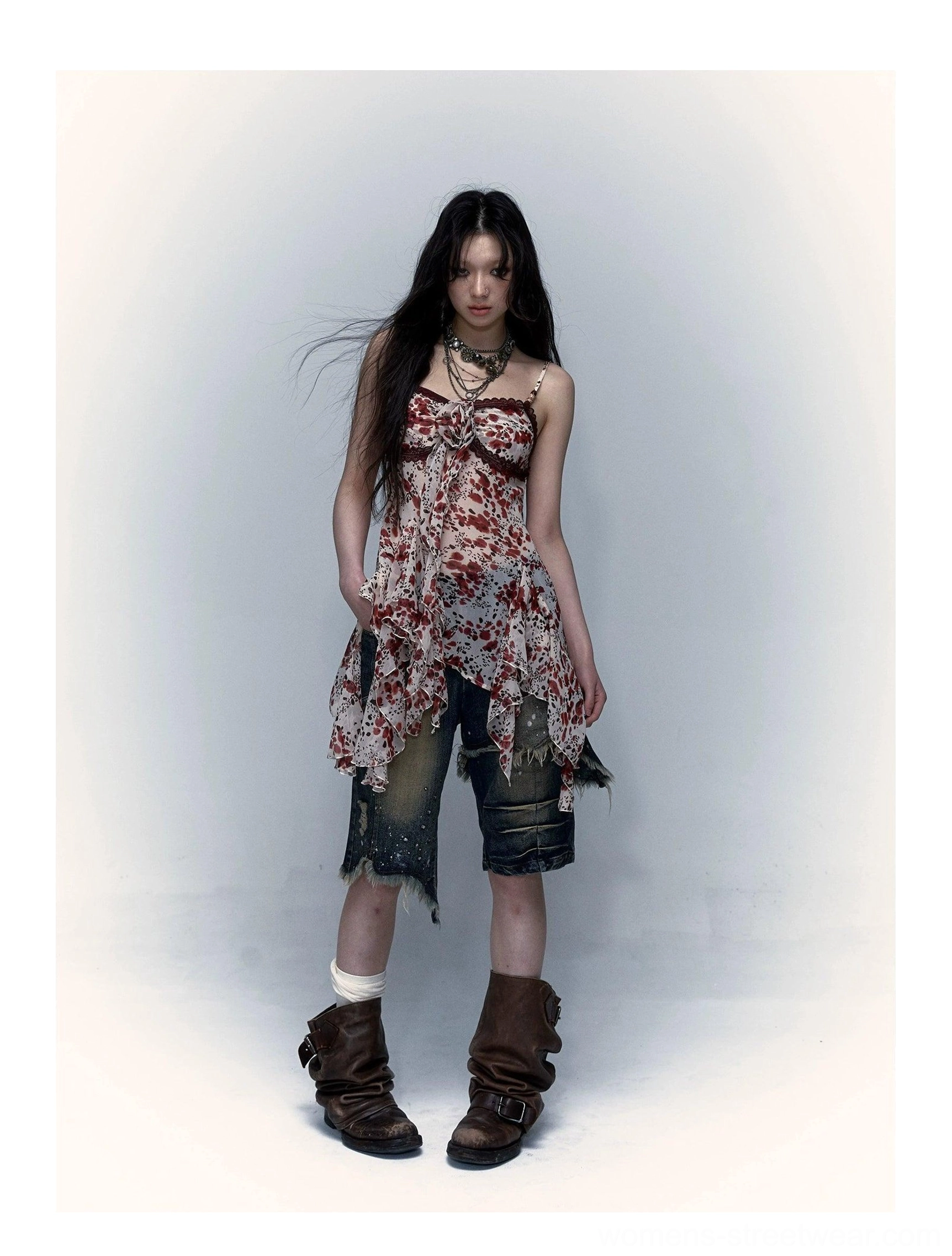 Vintage floral print Y2K handkerchief-hem camisole styled with distressed denim shorts and work boots
