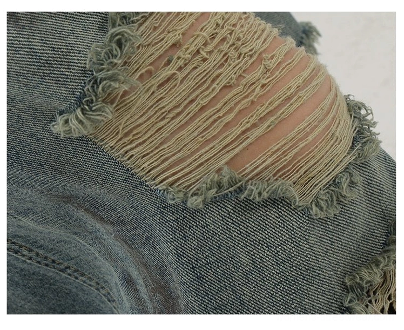 Y2K-style women's blue distressed wide-leg jeans with retro fading, shredded details, and relaxed drape