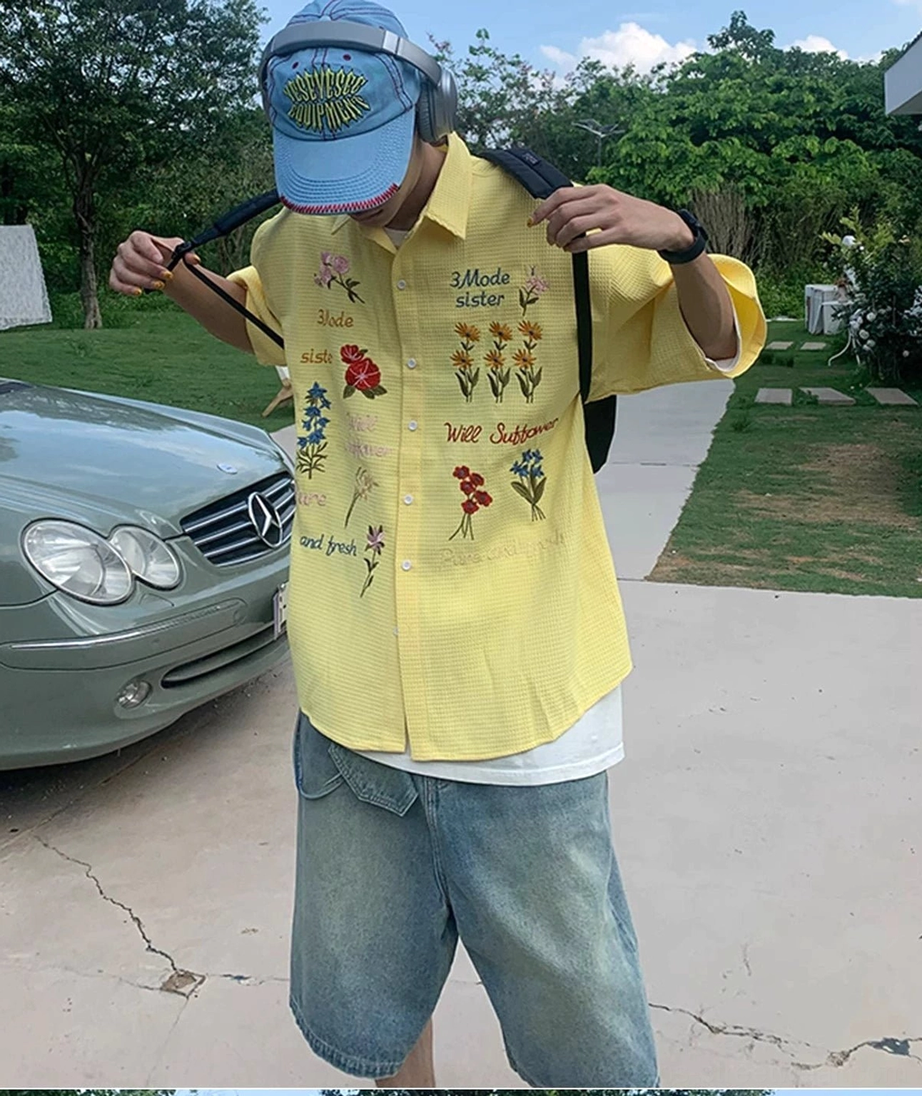 Yellow waffle-textured embroidered flower shirt styled with casual trousers for a bold Y2K Korean fashion outfit