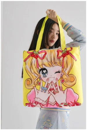 Yellow kawaii anime girl printed tote bag with neon yellow adjustable crossbody strap styled with Y2K fashion