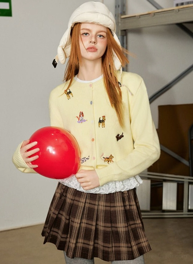 Yellow puppy embroidered knit cardigan with colorful dog motifs styled in a cute Korean casual streetwear outfit