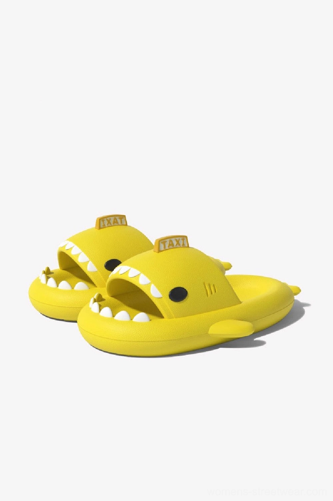 Pair of yellow taxi shark slide slippers with TAXI decoration and open-mouth shark shape